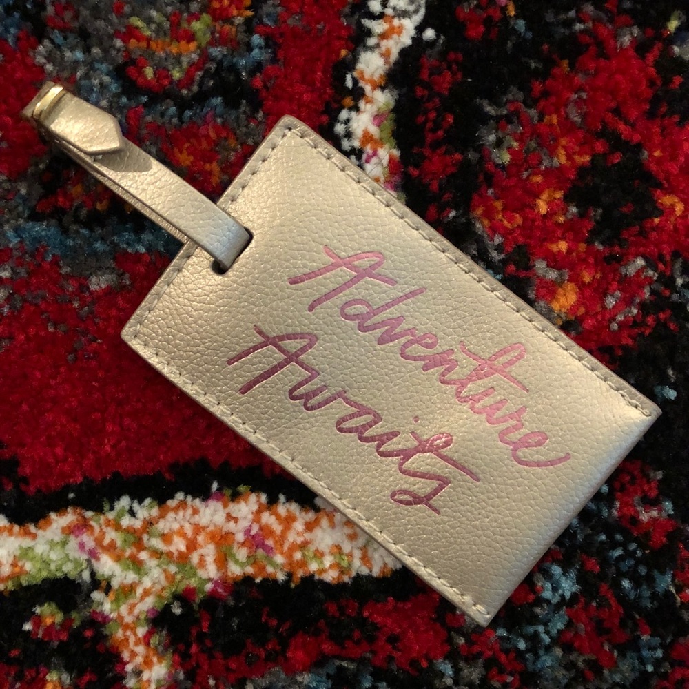 Anthropologie “adventure awaits” luggage tag